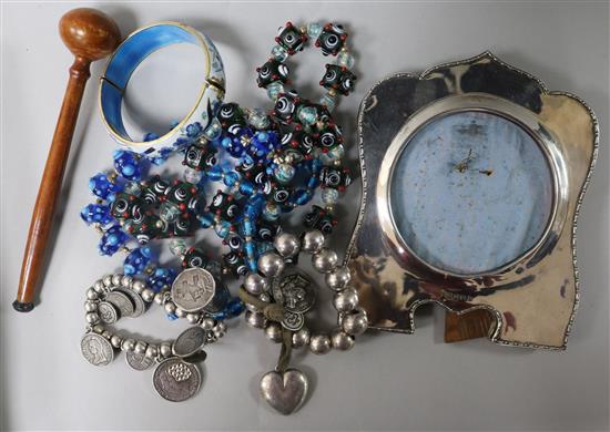 Mixed costume jewellery and a George V silver mounted photograph frame.
